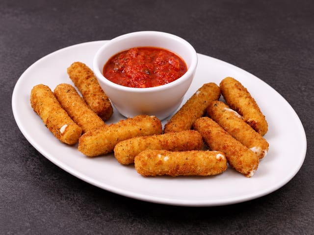 Basket of Breaded Fried Mozzarella Sticks.